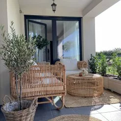 Beliani Loungeset 4-zits Rotan Natuurlijk/crèmewit DOLCEDO/LIMNI -Exporteren Stoelen Winkel undef src sa picid 836014 type whitesh image 1 scaled